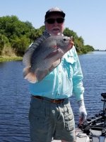 Mike Calloway with a nice size trash fish at Okeechobee